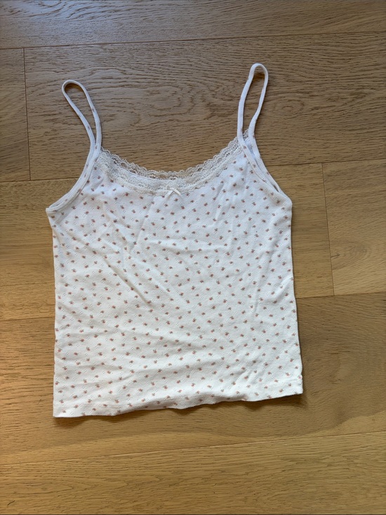 Brandy Melville Tops - Brandy Melville White Camisole with Small Rose Floral Print